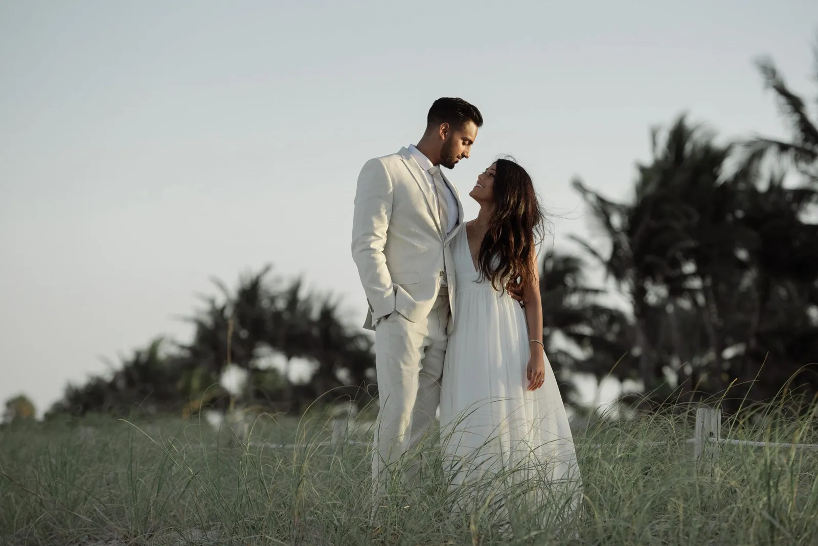 Beach wedding ceremony setup at South Pointe Park with modern architecture