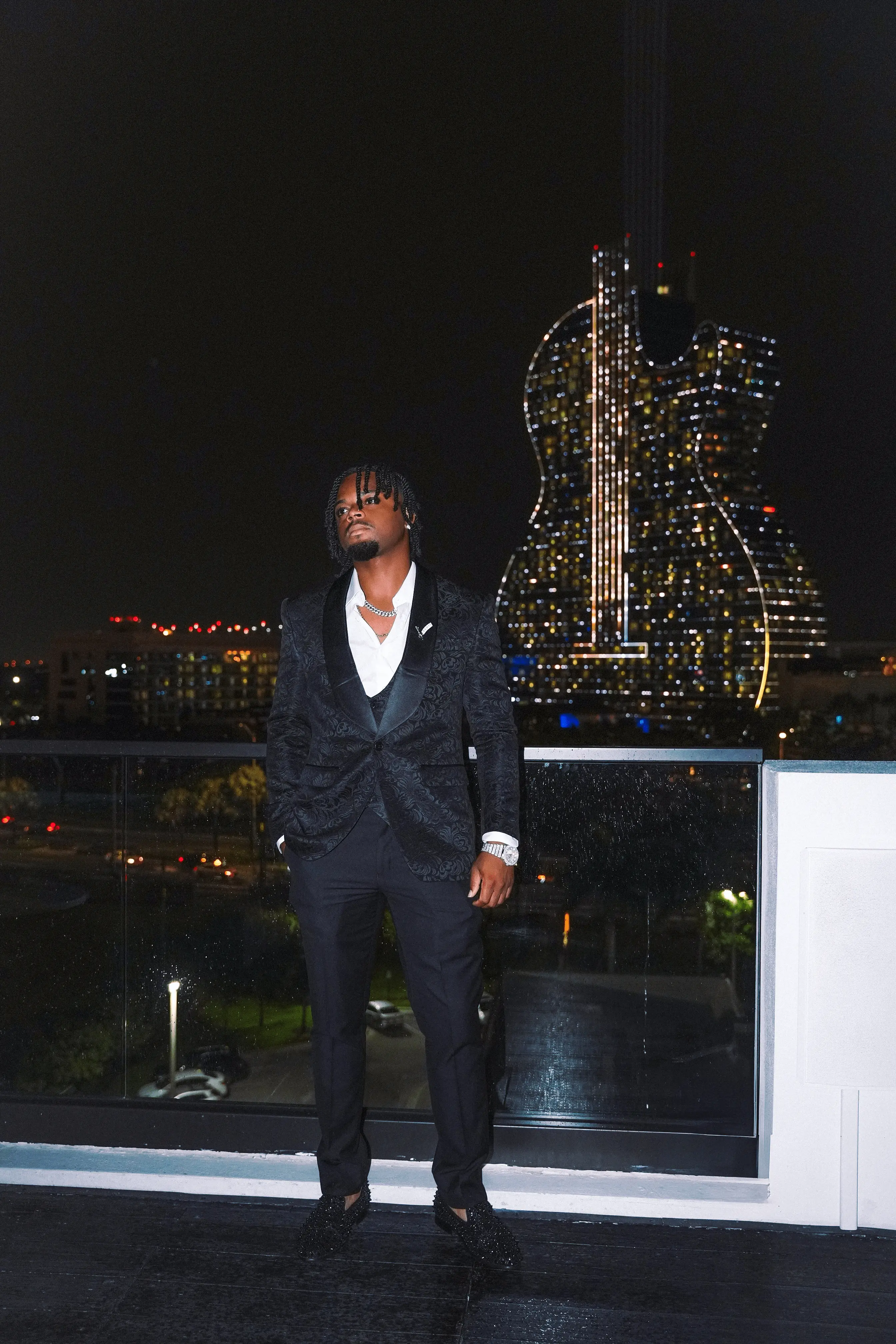 Affordable couples photographer Miami — final close portrait with Hard Rock glow